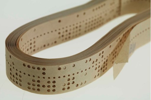 Computer paper tape with punched holes