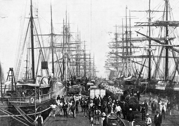 Hobsons Bay Railway Pier, Sandridge (now Station Pier, Port Melbourne), about 1878, showing one of two small steam locomotives used for shunting goods trucks on the pier.