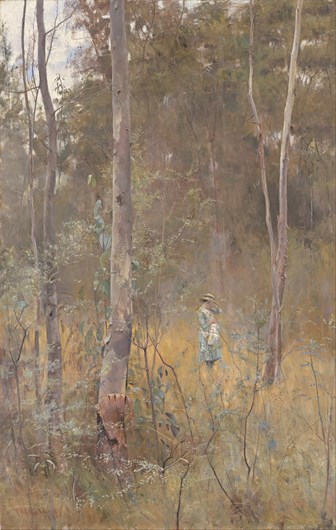 Young woman standing alone in the bush