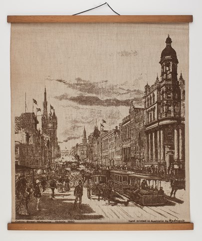 Natural linen wall hanging, featuring image of Collins Street, Melbourne, in the 1880s. Made circa 1960s. Designed by John Rodriquez, an influential Australian textile designer from the 1950s to 1970s. Screen printed by hand.