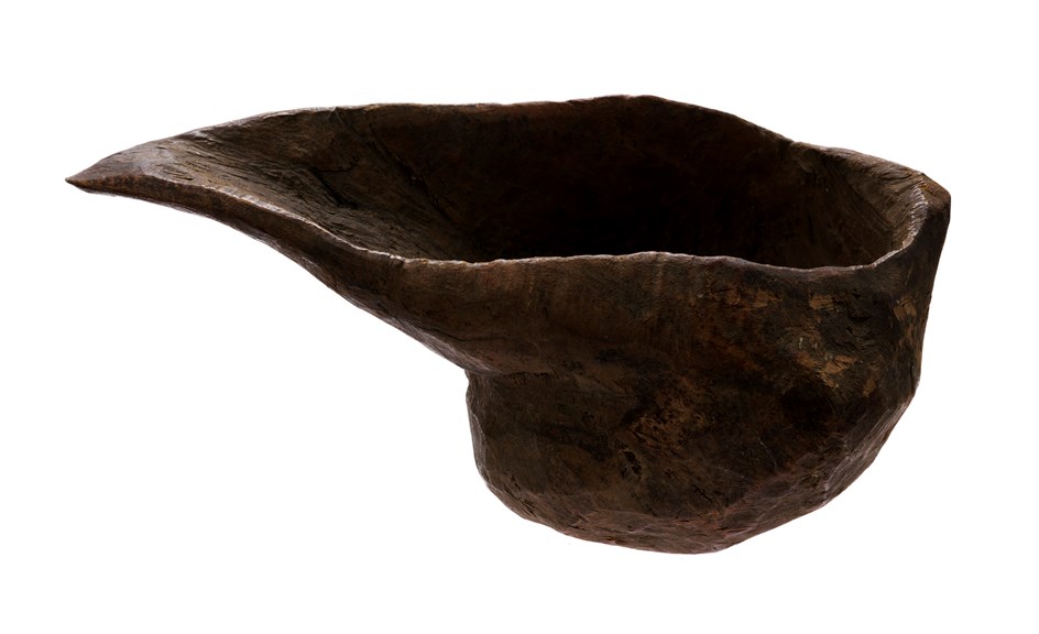 Drinking vessel. Shoe shaped of the wood of a gum tree, hollowed out by gouging and scraping.