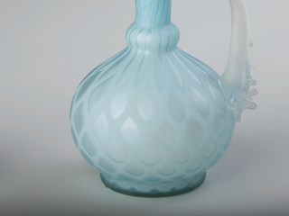 One of two blue glass vases, possibly made in France and alleged to have been recovered from the Loch Ard wreck by the donor's great-grandfather William James and his brother James James.