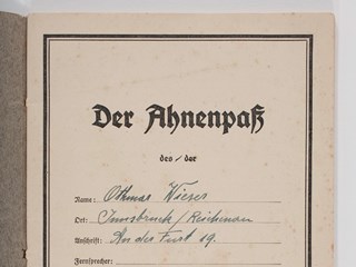 Small booklet, with forty-eight pages. It is inscribed on cover 'Der Ahnenpass ' (which translates as Passport of Ancestors) and with the eagle symbol of the Third Reich.