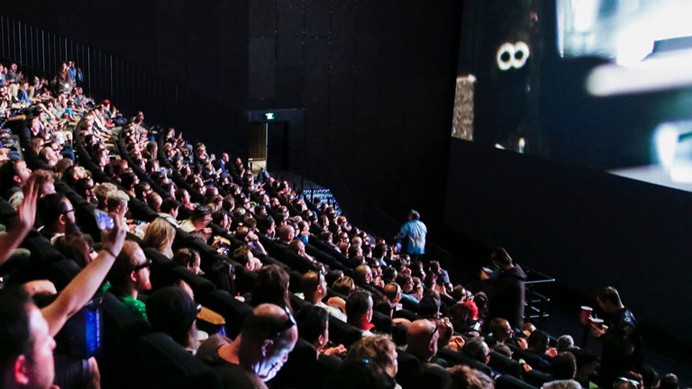 audience in a large theatre