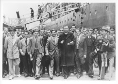 Immigrants from Malta arrive in Sydney, having disembarked from the SS Partizanka, 1948.