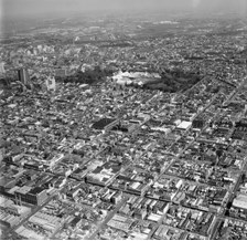 Urban sprawl: aerial view of Melbourne and suburbs, circa 1960