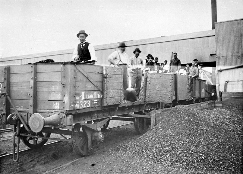 Strikebreaking office workers unloading coal from wagons