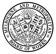M.M.B.W. corporate logo. The design incorporates the shields of the City of Melbourne and British Royal Coats of Arms in the centre with a kangaroo in front of a rising sun above them. Below the shields is a scroll bearing the Latin motto 'Publica Salus Mea Merces' (meaning 'Public Health is my Reward'), above the date '1891' representing the year the organisation was formed. Around the perimeter in a ring are is the title 'MELBOURNE AND METROPOLITAN * BOARD OF WORKS * '