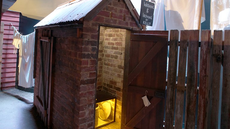 Recreated toilet building in an exhibition