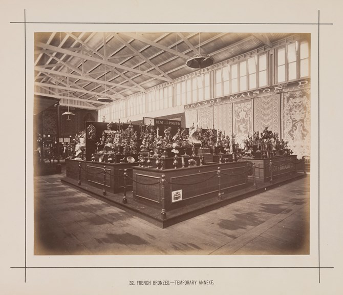 Interior view of a temporary annexe to the Royal Exhibition Building showing a display of French Bronzework during the Melbourne International Exhibition of 1880. Caption reads: French Bronzes.- Temporary Annexe