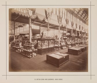 British China and Glassware display in the Royal Exhibition Building during the Melbourne International Exhibition of 1880. Caption reads: 15. British China and Glassware.- Main Avenue