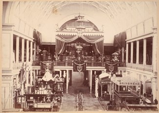 International Exhibition, Melbourne, 1880. Interior view of the Exhibition Building showing the exhibits in the Imperial German Tent on the mezzanine of the Great Hall, and other exhibitors at ground level in the northern transept.