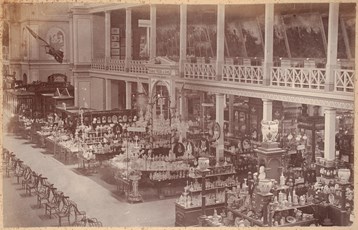International Exhibition, Melbourne, 1880. Interior view of the Exhibition Building showing the German and British Courts with their exhibits of decorative arts and domestic ware in the Great Hall. The British fine art displays in the balcony area of the eastern nave are also visible.