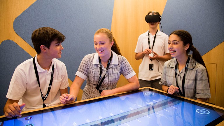 Students engaging with the TAC  Road To Zero Education Learning Centre interactives.