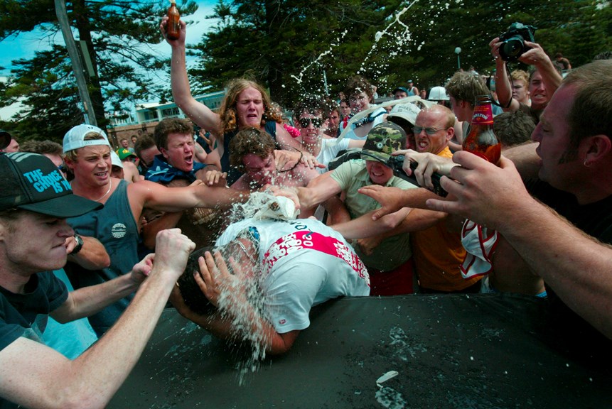 An angry mob bash and smash beer bottles on head of an innocent man at North Cronulla beach on Sunday 11 December 2005. 