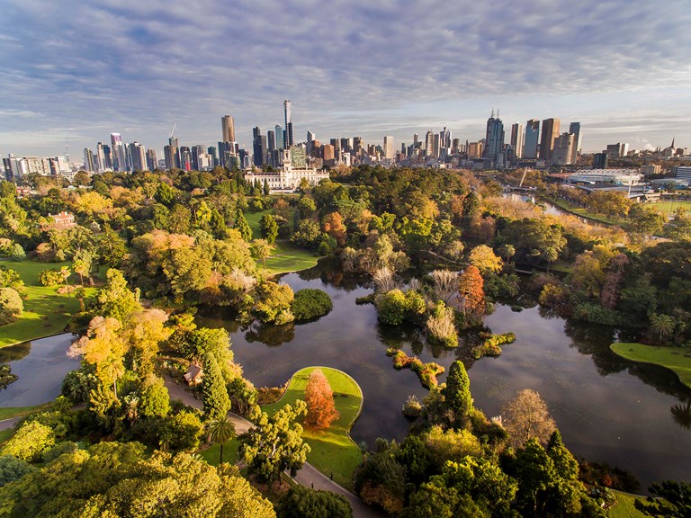 Sweeping view over Melbourne Gardens and Ornamental Lake with the city of Melbourne in the background