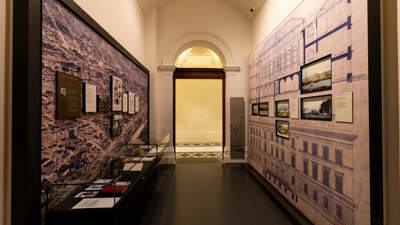 Display cabinets in  Voices Across Time exhibition at the Immigration Museum