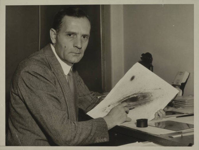 Edwin Hubble with photographic print of Andromeda Galaxy M31 in which Cepheid Variables were identified.