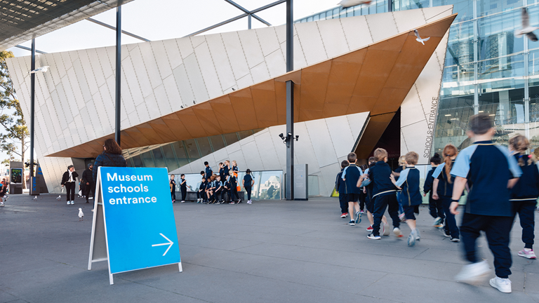 Children entering the Melbourne Museum School's entrance.