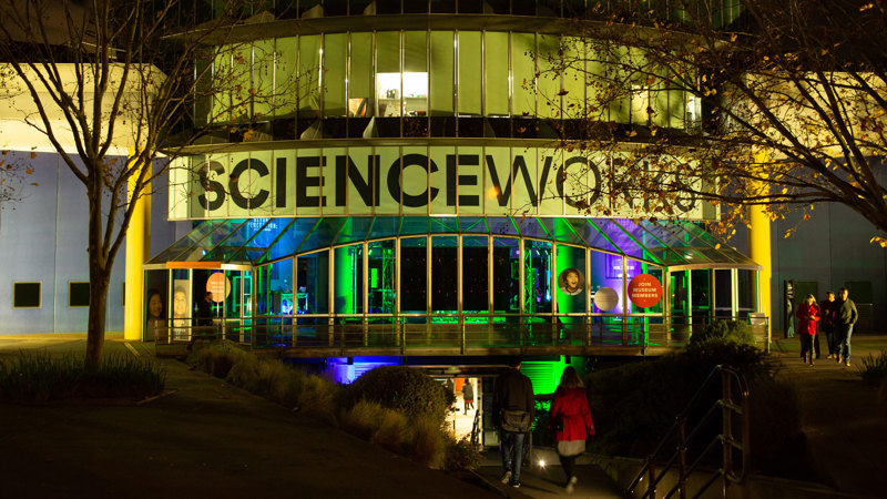The entry to Scienceworks Museum at night.