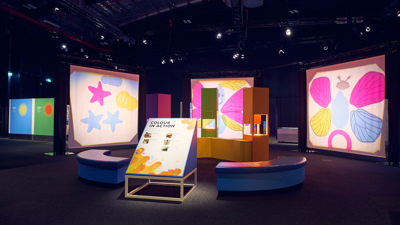 Displays showing colourful seastars and insects in Colour exhibition at Scienceworks.