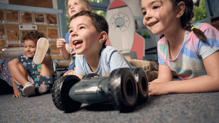 Kindergarten children explore and code rover robots on an imaginary mission to Mars, programming robots around obstacles as they discover how robots can be programmed during Museum Victoria's Rockets and Robots kindergarten incursion program.