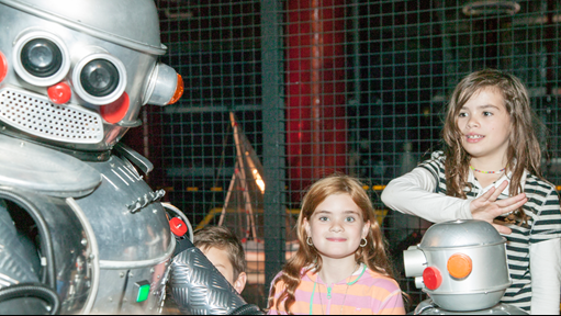  Tubby the Robot with children in the Lightning Room at ScienceWorks.