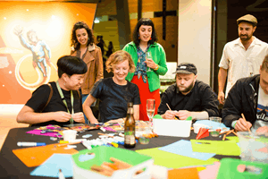 Adults crafting during Nocturnal, Melbourne Museum.