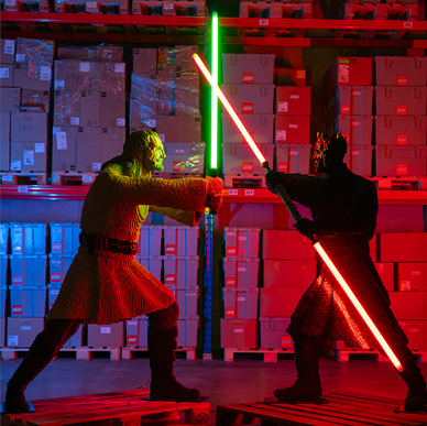 Qui-Gon Jinn the Jedi master and the Darth Maul the Sith Lord crossing lightsabers in a duel at LEGO for LEGO® Star Wars: The Exhibition at Melbourne Museum.