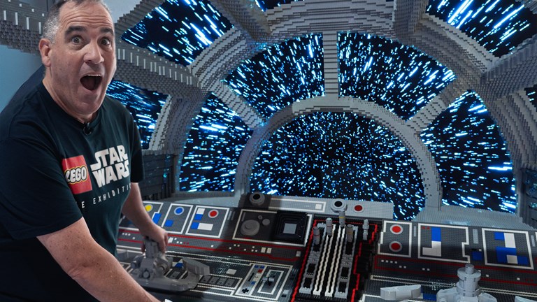 Ryan ‘Brickman’ McNaught in the Millenium Falcon cockpit in LEGO® Star Wars: The Exhibition at Melbourne Museum.