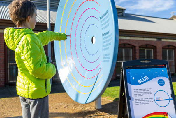 A small boy searching for colours as part of the colour hunt at scienceworks during the Spring school holidays.