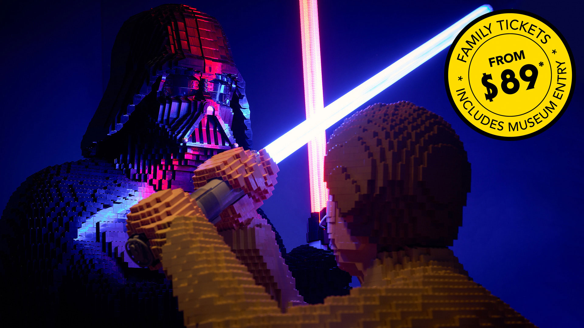 The Sith Lord Darth Vader and Jedi Luke Skywalker crossing lightsabers in a duel LEGO for LEGO® Star Wars: The Exhibition at Melbourne Museum.