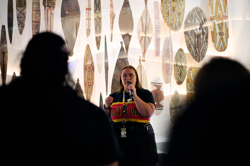 A Museums Victoria expert giving a tour of the First Peoples exhibition.