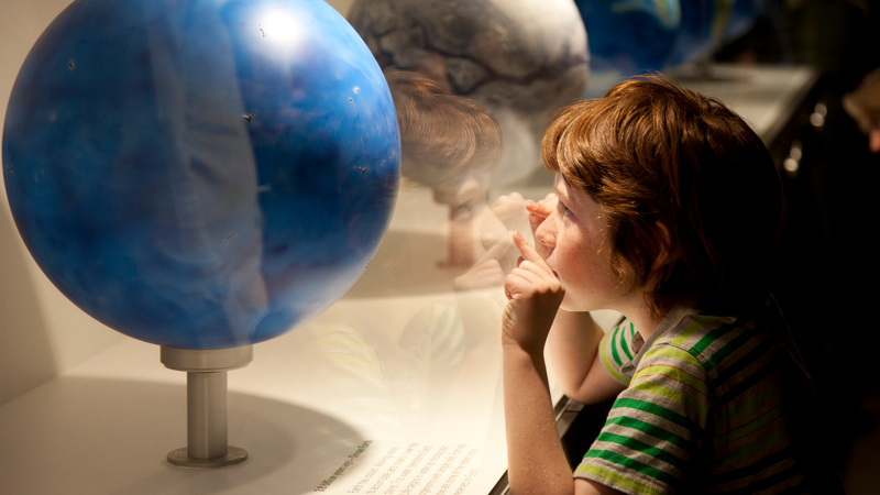 A child views the globe display at the launch of the Dynamic Earth exhibition.