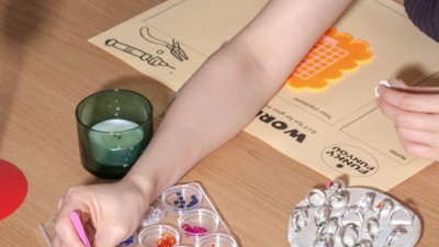 People choosing stones for their ring.