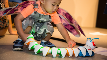  Child playing with a Code-a-pillar in the Energy Lab during the Little Kids Day In program at Scienceworks, February 1st, 2021.