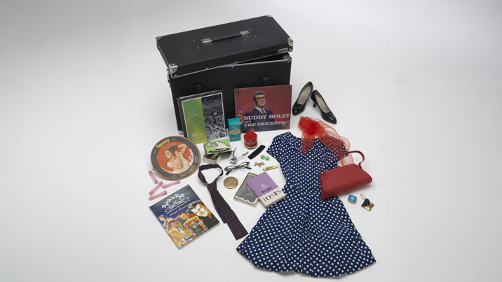 Various objects and props from Rock ‘n’ roll reminiscing kit used in outreach program