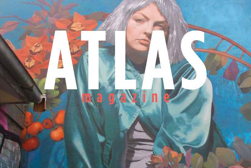Street art portrait of a person with short grey hair and a silk jacket surrounded by red flowers. Overlaid text reads 'Atlas Magazine'.