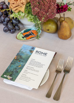 Seated dinner at Melbourne Museum, with themed dining setup alongside a private viewing of ROME: Empire, Power, People. Source: Museums Victoria