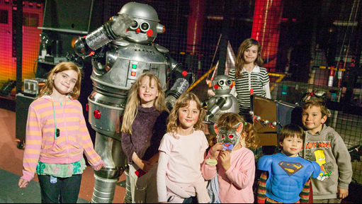  Tubby the Robot with children in the Lightning Room at ScienceWorks.