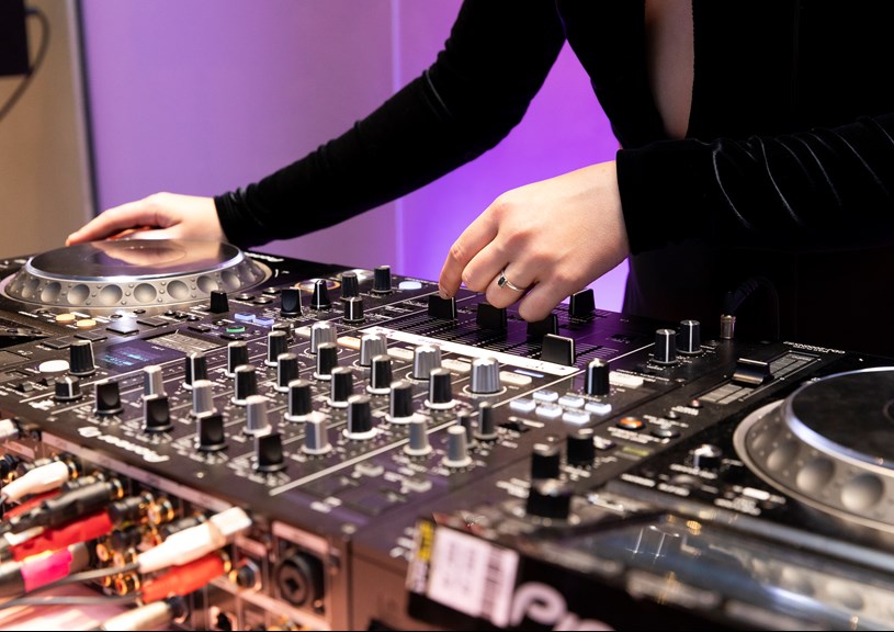 A DJ works her decks at Nocturnal, Melbourne Museum.