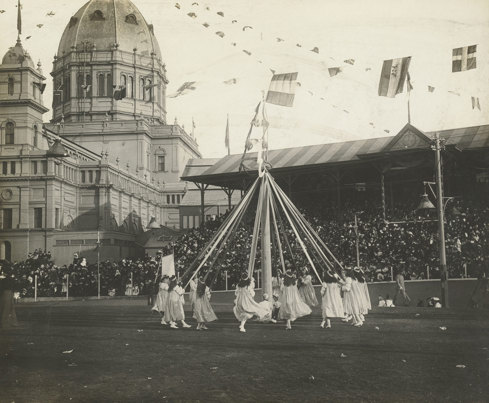 Maypole Dances at the Children's Fete on the Exhibition Oval, in front of the Duke and Duchess of Cornwall and York, on 11 May 1901. 