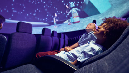 Children watching a show in the Planetarium at Scienceworks.