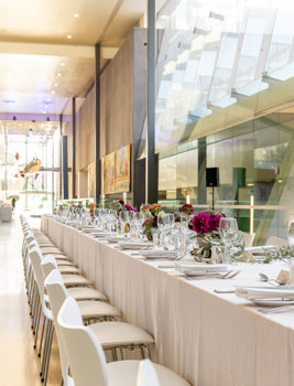 Seated dinner at Melbourne Museum, with themed dining setup alongside a private viewing of ROME: Empire, Power, People. Source: Museums Victoria
