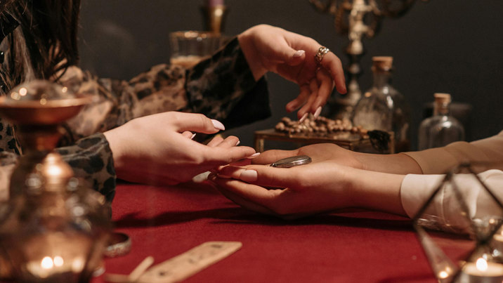 A mistic doing a seance