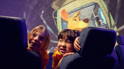 Two primary school students viewing Tycho goes to Mars on an excursion to the Melbourne Planetarium.
