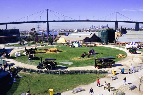Overhead view (from roof of main building) of stationary and mobile steam machinery displays on the arena as part of the Pumping Station Festival at Scienceworks, 1995.