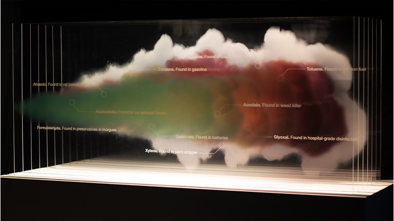 A plume of vape smoke labelled with its contents including: Arsenic, found in rat poison; Formaldehyde, found in preservation morgues; Acetonitrile, found in car exhaust fumes; Benzene, found in gasoline; Xylene, found in paint stripper; Chlorine, found in bleach; Cadmium, found in batteries; Acrolein, found in week killer; Toluene, found in aviation fuel; Glyoxal, found in hospital-grade disinfectant.