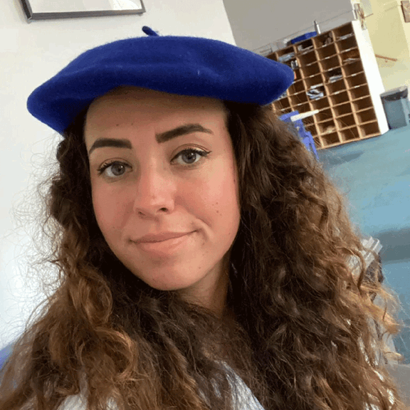 Nina Carcenac wearing a blue beret.