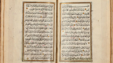 Open pages of a book with Arabic text